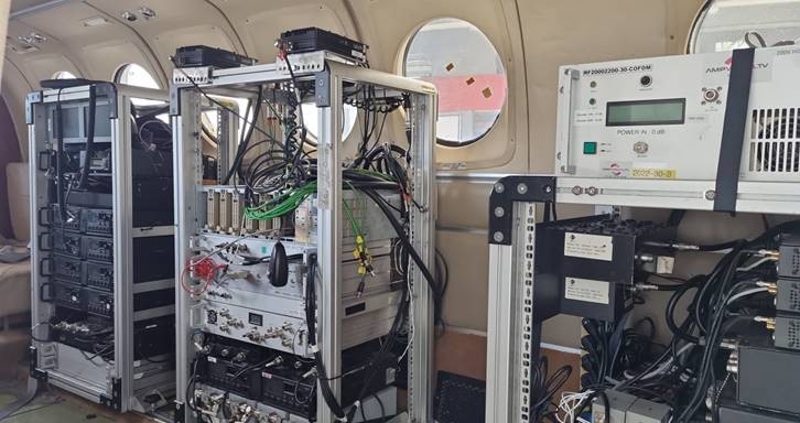 Broadcast equipment racks installed inside a WorldLinX King Air cabin